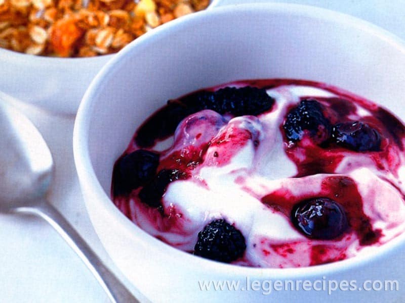Berries in syrup on yoghurt