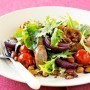 Spicy sausages with bean salad