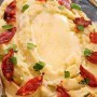 Warm salad of mashed potatoes with chorizo