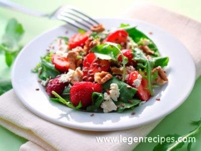 Salad with strawberries, cheese and nuts