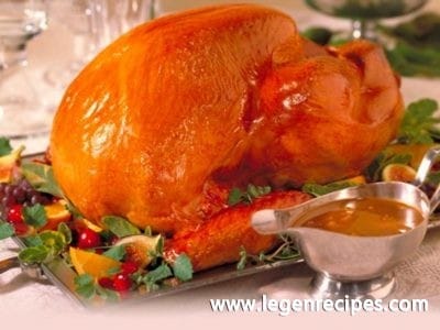 Apple-glazed roast turkey with stuffing and gravy