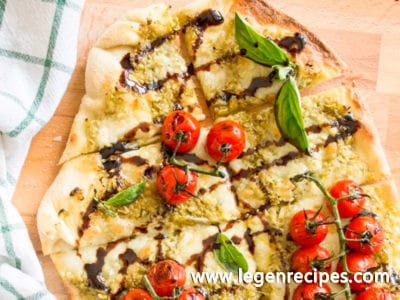 Blistered Caprese Pizza with Garlic Scape Pesto